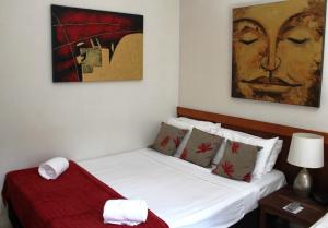 Ein Bett oder Betten in einem Zimmer der Unterkunft Bohemia Resort Cairns
