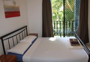 Ein Bett oder Betten in einem Zimmer der Unterkunft Bohemia Resort Cairns
