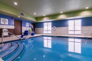 a swimming pool in a hotel room at Holiday Inn Express & Suites - Atchison, an IHG Hotel in Atchison