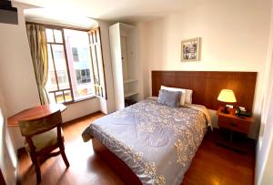 Postel nebo postele na pokoji v ubytování Rio Hotel