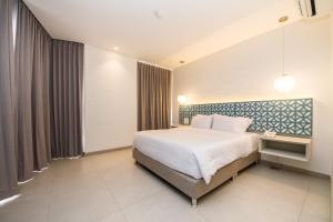 Cama o camas de una habitación en Samawi Hotel