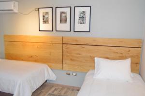 Rúm í herbergi á Hotel Cinco Tierras