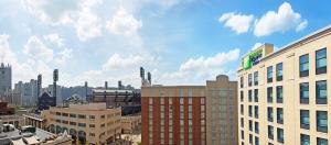 a view of a city with tall buildings at Holiday Inn Express & Suites Pittsburgh North Shore, an IHG Hotel in Pittsburgh