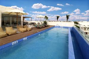
The swimming pool at or near Holiday Inn Express & Suites - Playa del Carmen, an IHG Hotel
