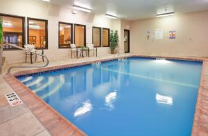 a large pool with blue water in a hotel room at Holiday Inn Express Kansas City Liberty Missouri, an IHG Hotel in Liberty