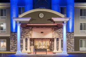 a building with a bench in front of it at Holiday Inn Express & Suites Philadelphia - Mt Laurel, an IHG Hotel in Mount Laurel