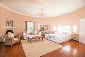 
a living room filled with furniture and a window at Agroturismo Can Talaias San CArlos in Sant Carles de Peralta
