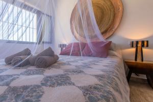 Ένα ή περισσότερα κρεβάτια σε δωμάτιο στο Casita rural en Centro de Hípica