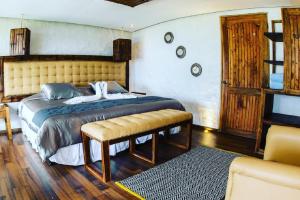 Voodi või voodid majutusasutuse Tunas & Cabras Hotel toas