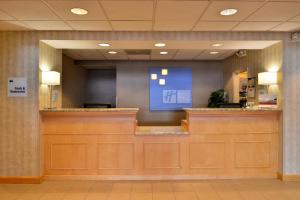 a large room with a large counter and a large window at Holiday Inn Express & Suites - Ocean City, an IHG Hotel in Ocean City