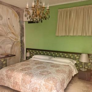 Posteľ alebo postele v izbe v ubytovaní Cortiletto d'Alba camere con ristorante
