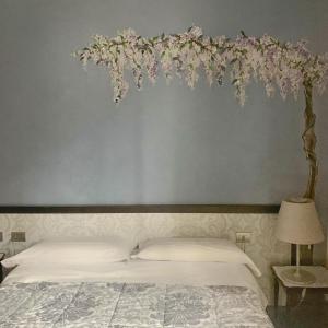 Posteľ alebo postele v izbe v ubytovaní Cortiletto d'Alba camere con ristorante