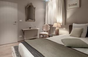 Voodi või voodid majutusasutuse Auberge l'Entrecôte toas