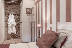 Voodi või voodid majutusasutuse Auberge l'Entrecôte toas