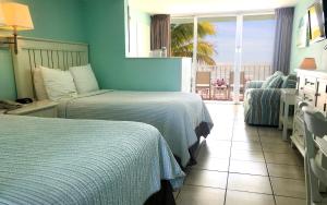 Posteľ alebo postele v izbe v ubytovaní Lani Kai Island Resort
