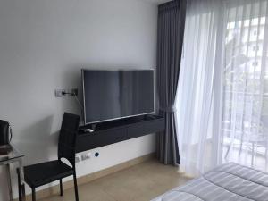 TV a/nebo společenská místnost v ubytování Centara Avenue a4,Near WALKING STREET,freePOOL,GYM