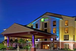 a hotel with a gazebo in front of it at Holiday Inn Express Hotel & Suites Port Richey, an IHG Hotel in Port Richey