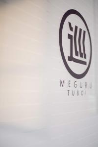 un logotipo para el hotel Mercury Tudor en Kumamoto - Apartment / Vacation STAY 76520 en Kumamoto