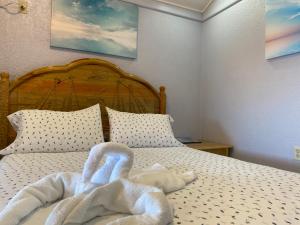 Voodi või voodid majutusasutuse Sea Eye Hotel - Sunset Building toas