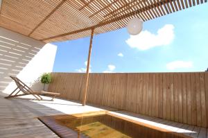 Swimmingpoolen hos eller tæt på Zen no Yu