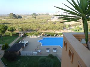 Basen w obiekcie Apartamento primera linea Isla Canela lub w pobliżu