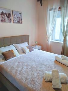 Posteľ alebo postele v izbe v ubytovaní Eveline House