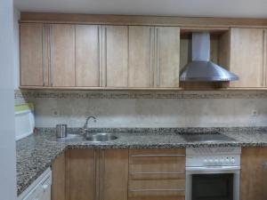 Kuchnia lub aneks kuchenny w obiekcie Apartamento primera linea Isla Canela