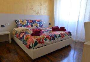A bed or beds in a room at Sophie's Choice 2 a San Pietro