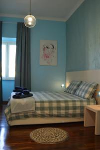 A bed or beds in a room at Sophie's Choice 2 a San Pietro