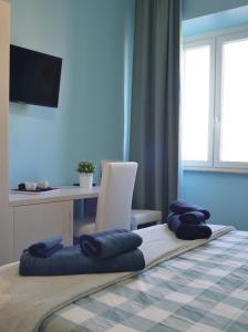 A bed or beds in a room at Sophie's Choice 2 a San Pietro