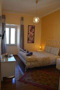 A bed or beds in a room at Sophie's Choice 2 a San Pietro