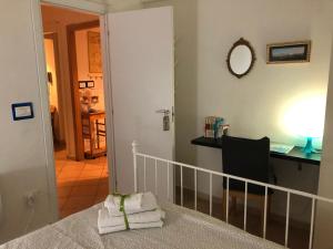 Posteľ alebo postele v izbe v ubytovaní Caio Asinio Apartment