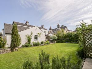 an image of a house with a yard at The White House in Grange Over Sands