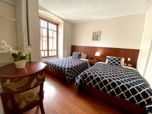Postel nebo postele na pokoji v ubytování Rio Hotel