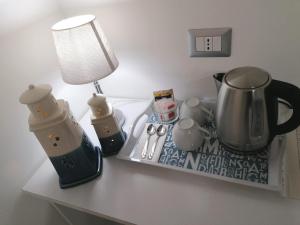 Příslušenství pro přípravu čaje a kávy v ubytování B&B Audafra