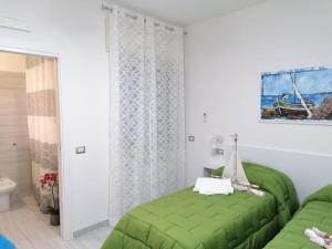 Postel nebo postele na pokoji v ubytování B&B Audafra