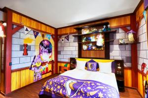 Ein Bett oder Betten in einem Zimmer der Unterkunft LEGOLAND Castle Hotel