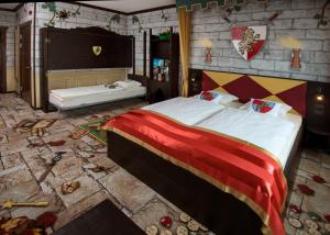 Postel nebo postele na pokoji v ubytování Hotel Legoland