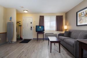 TV a/nebo společenská místnost v ubytování Siesta Suites