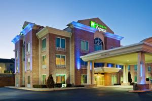 a hotel with a sign that reads first hotel at Holiday Inn Express Hotel & Suites London by IHG in London