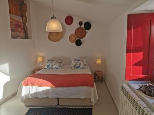 Postel nebo postele na pokoji v ubytování Casa da Cisterna