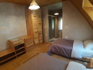 Postel nebo postele na pokoji v ubytování Hotel Restaurant Alpet Theth