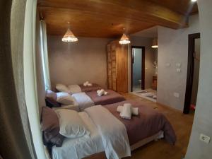 Postel nebo postele na pokoji v ubytování Hotel Restaurant Alpet Theth