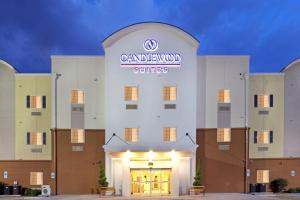 a front view of a building with a sign on it at Candlewood Suites - Nashville Metro Center, an IHG Hotel in Nashville