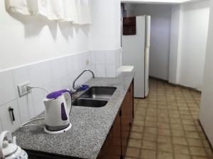 Apartment Chunin Depart tesisinde mutfak veya mini mutfak
