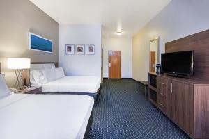 Voodi või voodid majutusasutuse Holiday Inn Express & Suites - Pharr by IHG toas