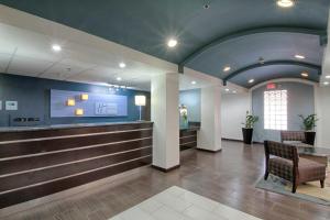 a lobby of a hospital with a waiting room at Holiday Inn Express Hotel & Suites Solana Beach-Del Mar, an IHG Hotel in Solana Beach