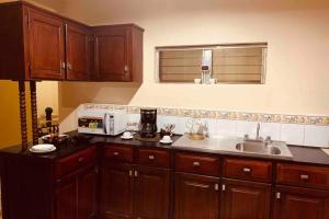 Η κουζίνα ή μικρή κουζίνα στο Hai Suite Apartamento