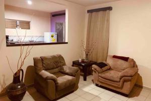 Χώρος καθιστικού στο Hai Suite Apartamento