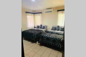 Ένα ή περισσότερα κρεβάτια σε δωμάτιο στο Hai Suite Apartamento
